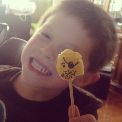 My adorable nephew enjoying his Oreo balls (shaped as lego heads on a stick --- a sort of fail on my part that I may one day tell you about).